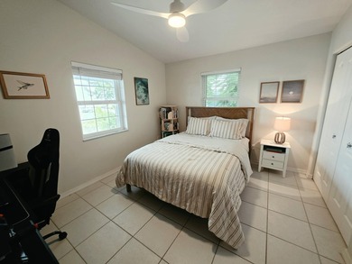 Elevated Coastal Living in Breezeswept Beach Estates. Skip the - photo 21