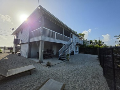 Elevated Coastal Living in Breezeswept Beach Estates. Skip the - photo 23