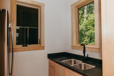 Discover unparalleled luxury at Camp Woodlands on Long Lake, an - photo 9