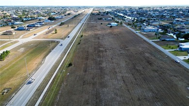 240' of frontage on Burnt Store Rd. Unlock the potential of this - photo 8