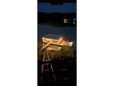 Indulge in waterfront living on approximately 5 serene acres at - photo 3