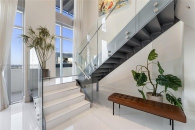 Turnkey! Short sale! Best-priced two-story penthouse in Midtown