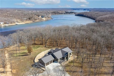 Indulge in waterfront living on approximately 5 serene acres at - photo 5