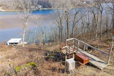 Indulge in waterfront living on approximately 5 serene acres at - photo 7
