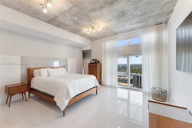 Turnkey! Short sale! Best-priced two-story penthouse in Midtown