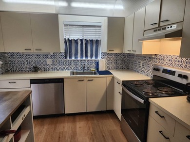 Welcome to this well-maintained 2-bedroom, 2-bath condo offering - photo 2
