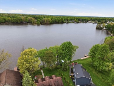 This cozy Lake front home with the warmth & charm of a private - photo 13