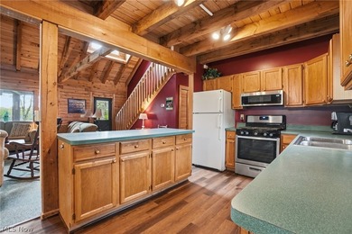 This cozy Lake front home with the warmth & charm of a private - photo 17