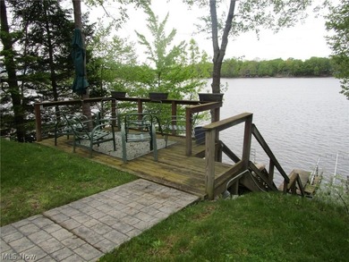 This cozy Lake front home with the warmth & charm of a private - photo 49