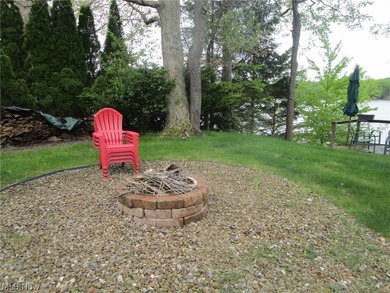 This cozy Lake front home with the warmth & charm of a private - photo 50