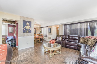 Welcome to this spacious and beautifully cared-for three-bedroom - photo 6