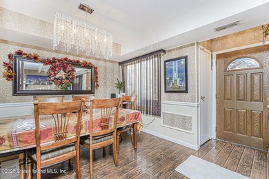 Welcome to this spacious and beautifully cared-for three-bedroom - photo 7