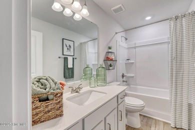 This Lawrence is a three-bedroom, two-bathroom single story home - photo 14