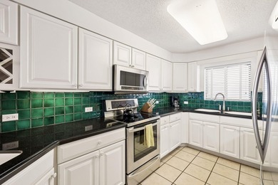 Experience exceptional beachfront living from this beautifully - photo 9