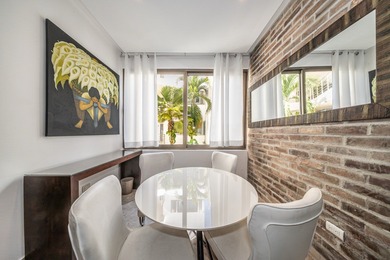 This spacious one-bedroom condominium is perfectly located in