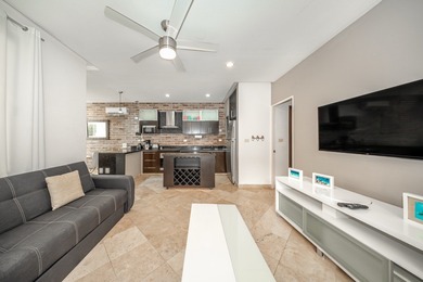 This spacious one-bedroom condominium is perfectly located in