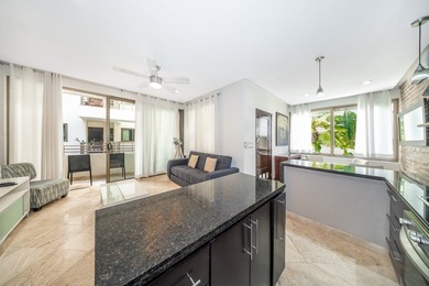 This spacious one-bedroom condominium is perfectly located in