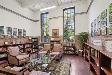 This charming, custom-designed two-bedroom condo at the historic