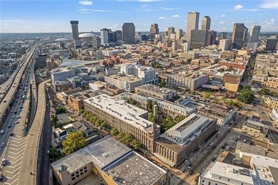 This charming, custom-designed two-bedroom condo at the historic