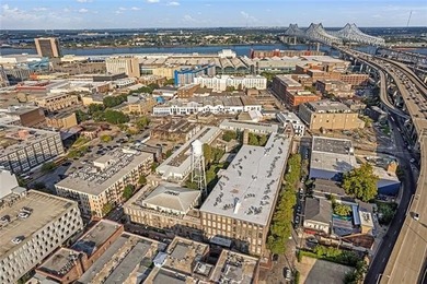 This charming, custom-designed two-bedroom condo at the historic