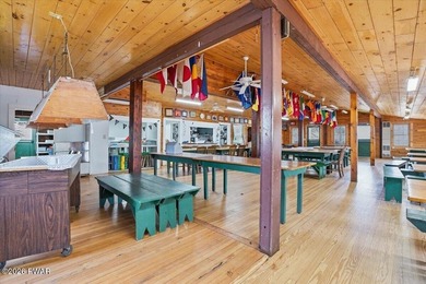 Set on 395 expansive acres, this rare offering features a fully - photo 11