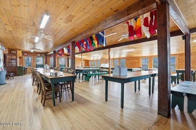 Set on 395 expansive acres, this rare offering features a fully - photo 12