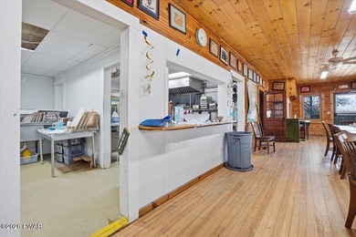 Set on 395 expansive acres, this rare offering features a fully - photo 16
