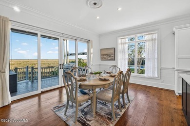 Set along the marsh in the prestigious gated community of - photo 17