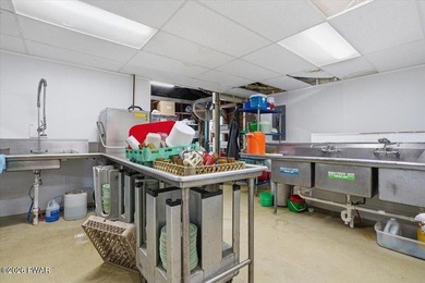 Set on 395 expansive acres, this rare offering features a fully - photo 20