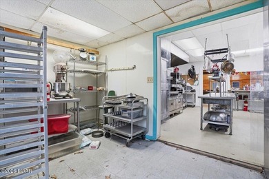 Set on 395 expansive acres, this rare offering features a fully - photo 21