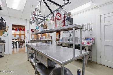 Set on 395 expansive acres, this rare offering features a fully - photo 22