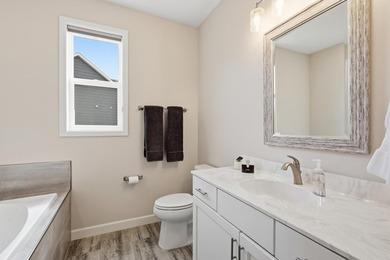 Welcome to this stunning custom-built home, perfectly situated - photo 22