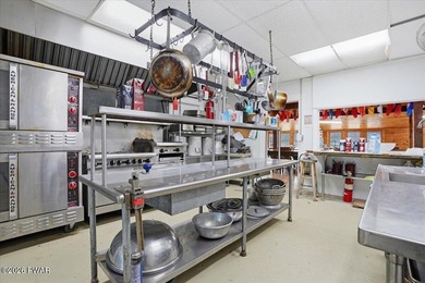 Set on 395 expansive acres, this rare offering features a fully - photo 24