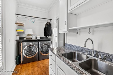Set along the marsh in the prestigious gated community of - photo 26