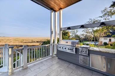 Set along the marsh in the prestigious gated community of - photo 27