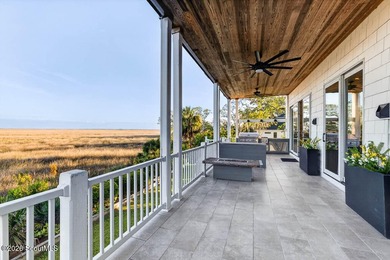Set along the marsh in the prestigious gated community of - photo 29