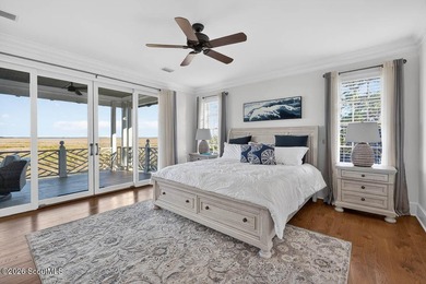 Set along the marsh in the prestigious gated community of - photo 30