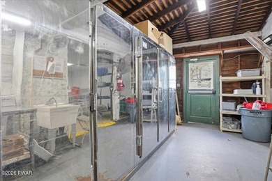 Set on 395 expansive acres, this rare offering features a fully - photo 30