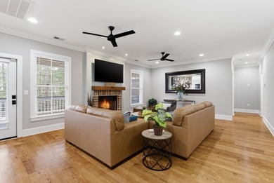 Experience elevated Low-country living at 613 Collins Creek