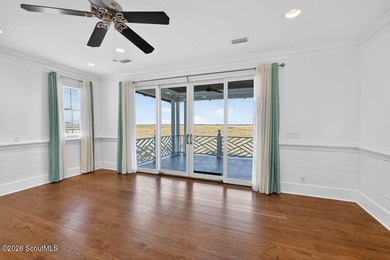 Set along the marsh in the prestigious gated community of - photo 43