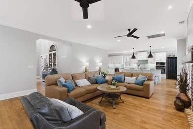 Experience elevated Low-country living at 613 Collins Creek