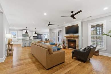 Experience elevated Low-country living at 613 Collins Creek