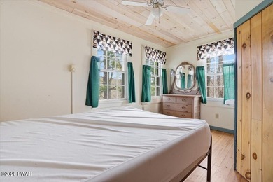 Set on 395 expansive acres, this rare offering features a fully - photo 46