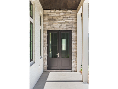 A showstopper of modern coastal elegance, 36 Sandcord Drive is a - photo 10