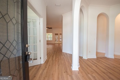 Beautiful well maintained home in Osprey Cove with brand new LVP - photo 3