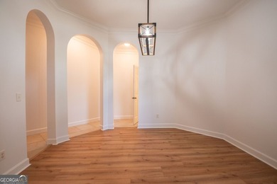 Beautiful well maintained home in Osprey Cove with brand new LVP - photo 6