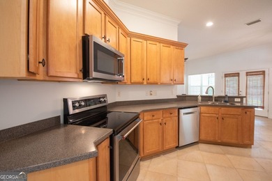 Beautiful well maintained home in Osprey Cove with brand new LVP - photo 8