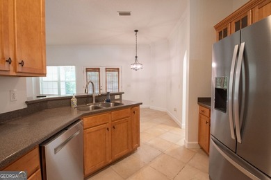 Beautiful well maintained home in Osprey Cove with brand new LVP - photo 9