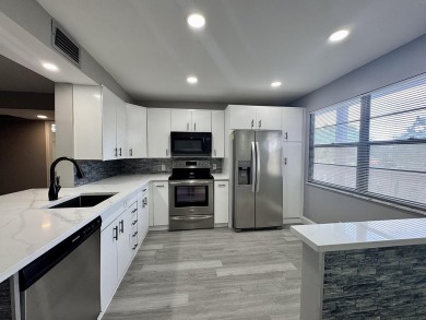 Lake Condo For Sale in Coconut Creek, Florida