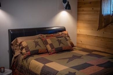This unique little cabin is as cute as a button. While is - photo 22